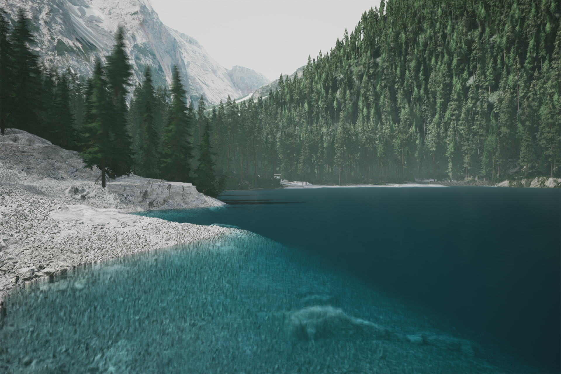 A photo taken in Lushfoil Photography Sim. A clear blue lake and its rocky shores are at the forefront, with tree-filled mountains slowly blurring into the background.