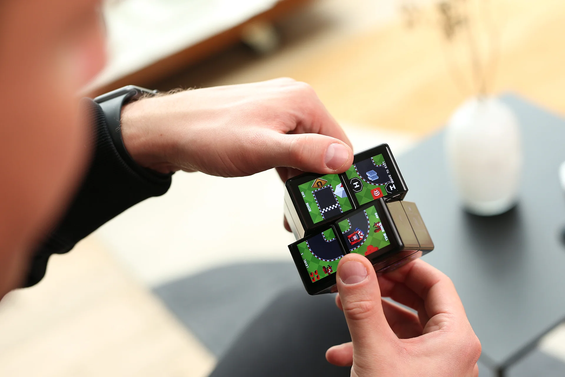 A photo of Rubik's WOWCube in use.