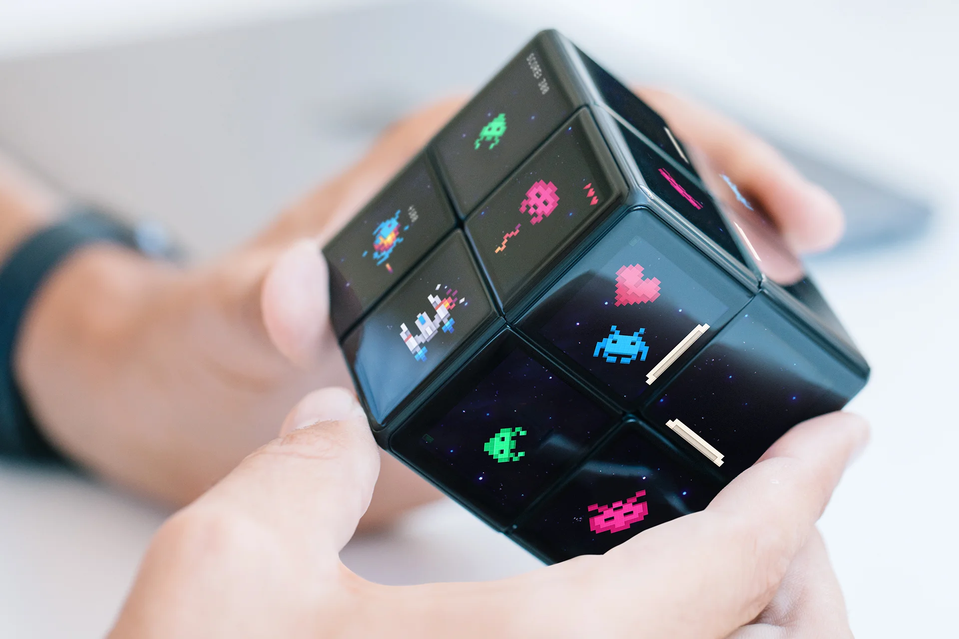 A photo of Rubik's WOWCube in use.