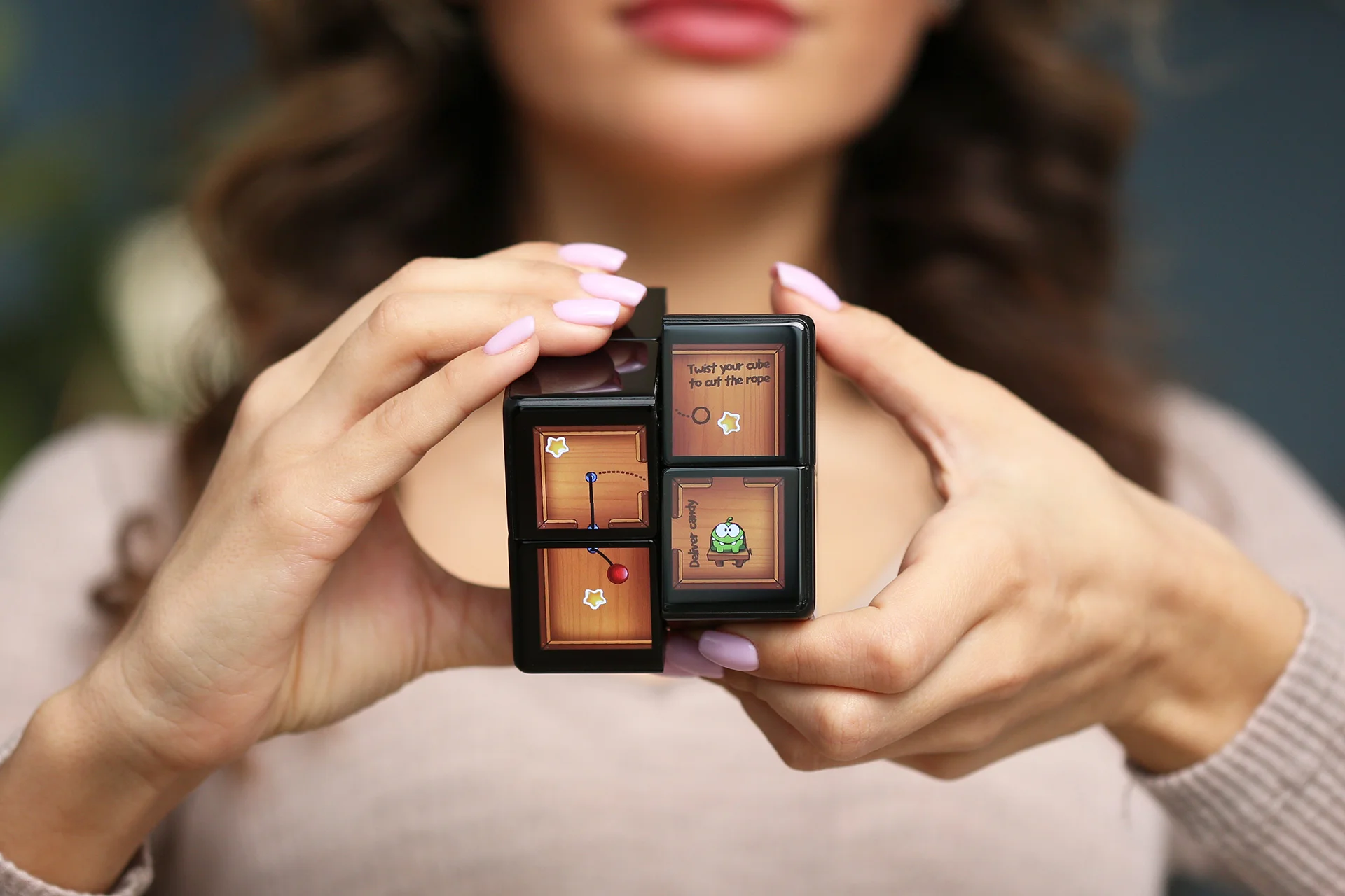 A photo of Rubik's WOWCube in use.